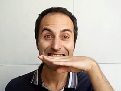italian hand gesture coi denti